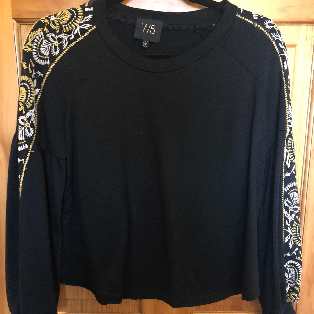 Embroidered sleeve black top